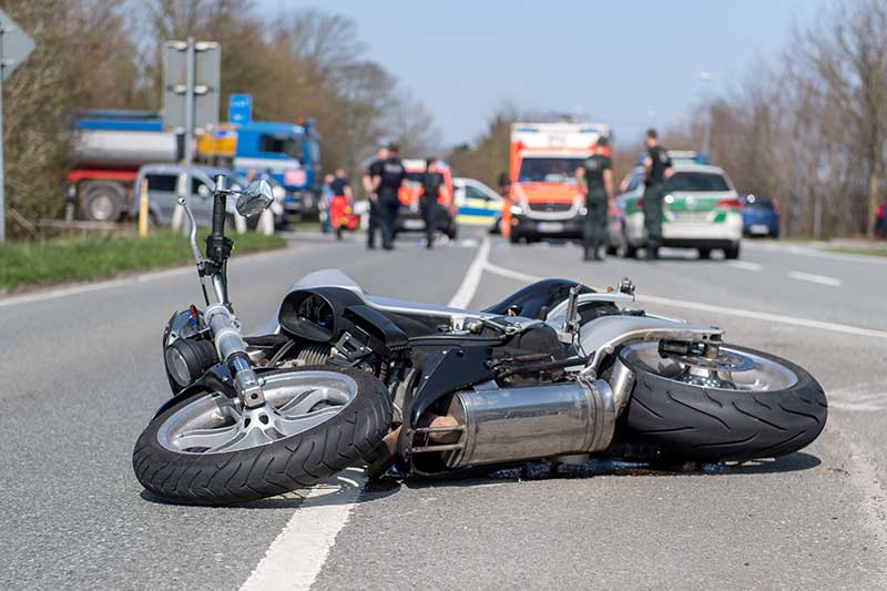 A crashed motorcycle on the highway